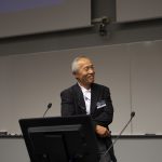 Miyasaka Masayuki giving presentation in December 2019